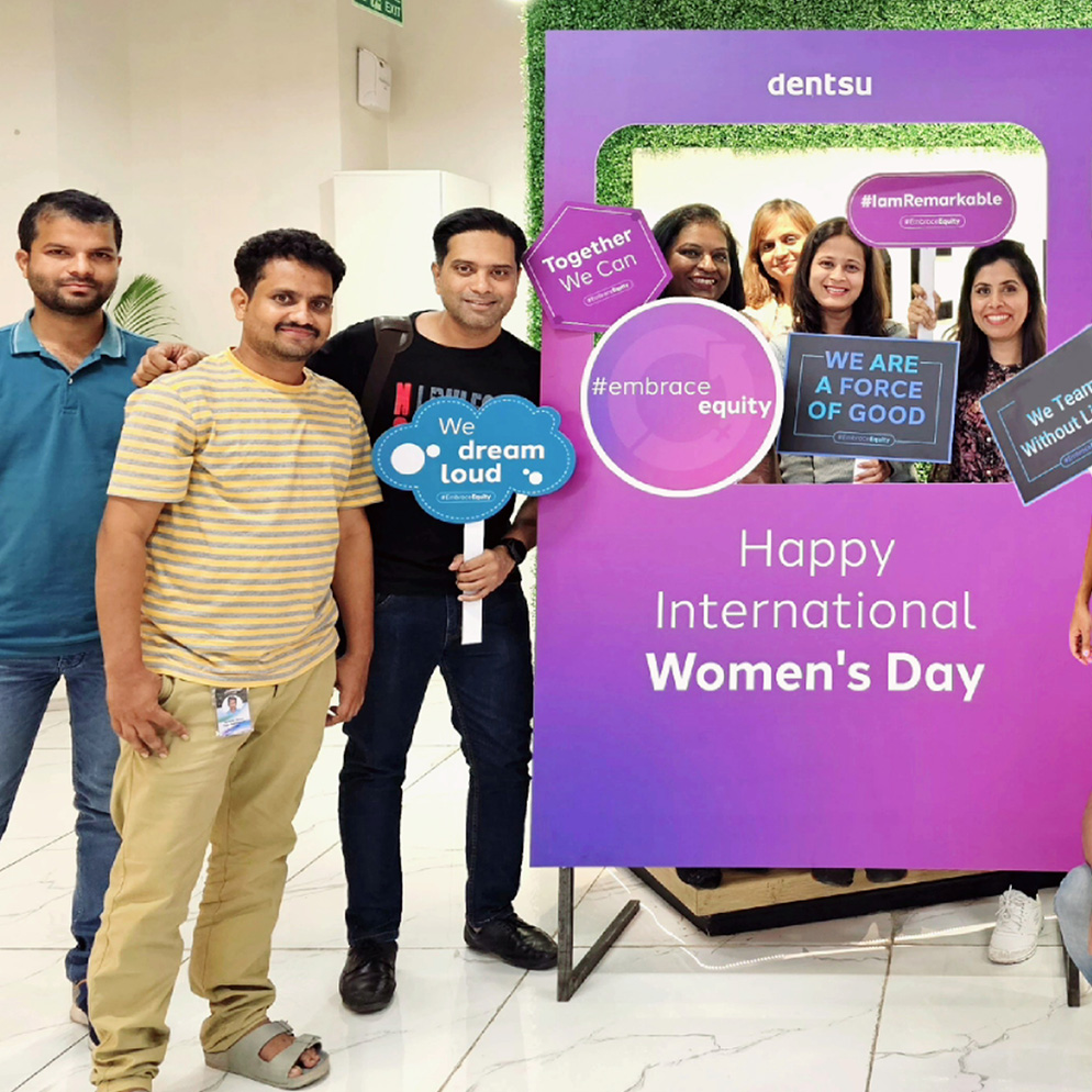 Group of men & women celebrating international women's day