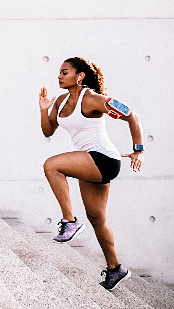 Runner sprinting up stairs