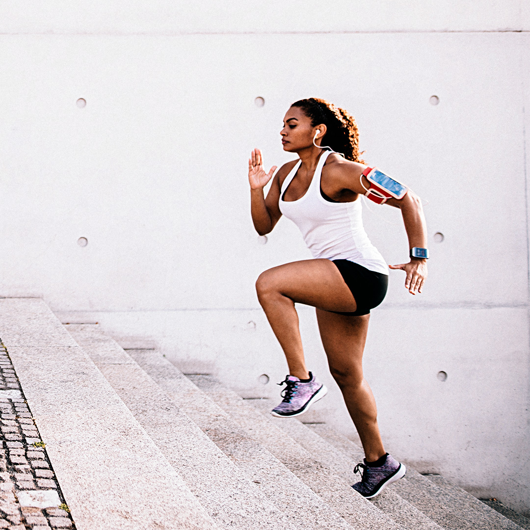 Runner sprinting up stairs