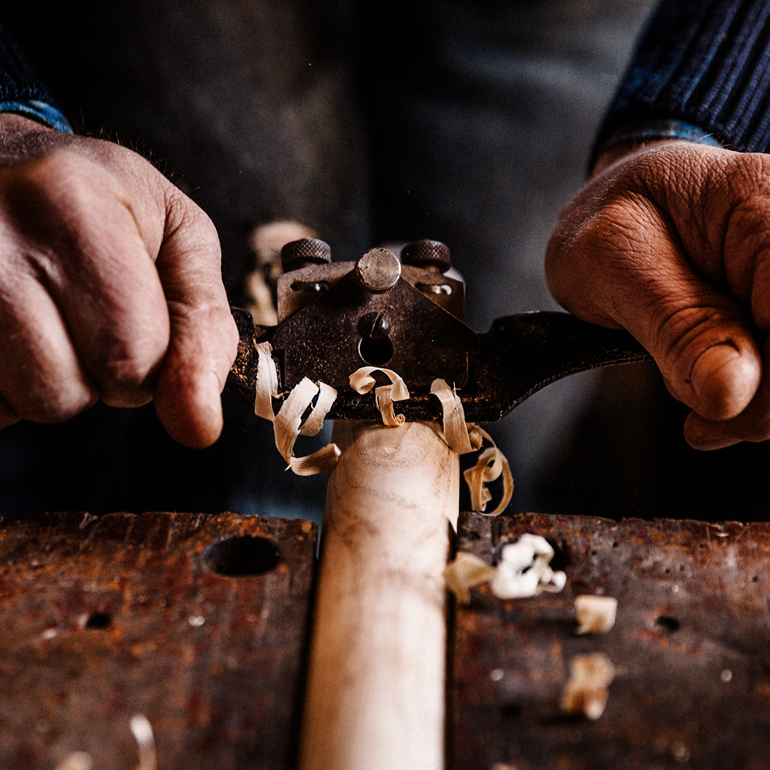 Hands using chisel