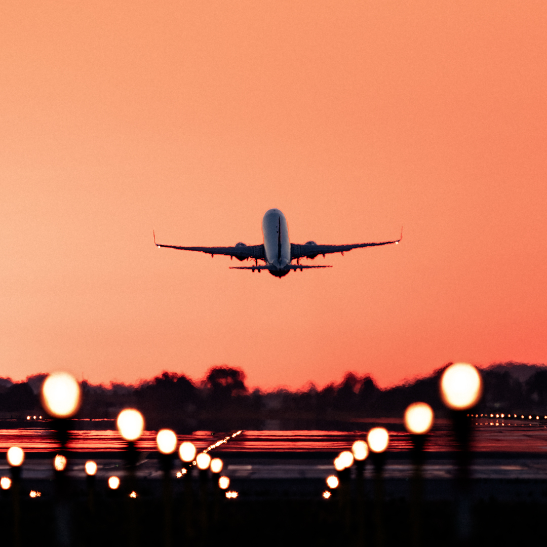 airplane taking off into flight