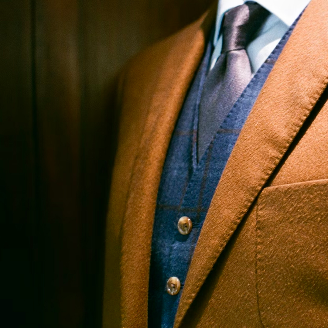 three piece suit and necktie