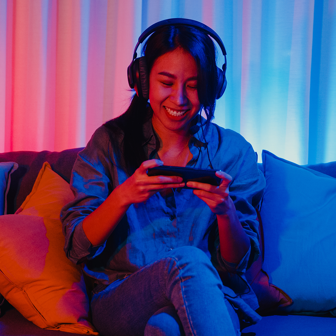 Woman on phone with headphones on