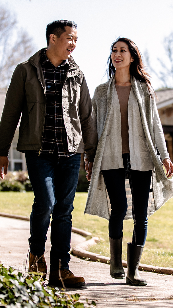 Couple holding hands