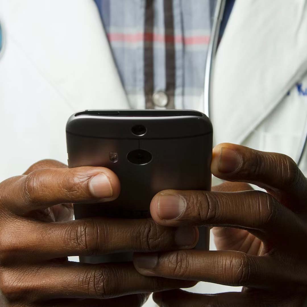 Doctor holding phone