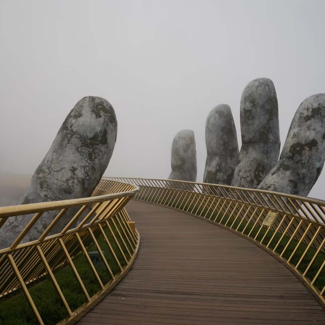 Cloudy bridge with sculpture