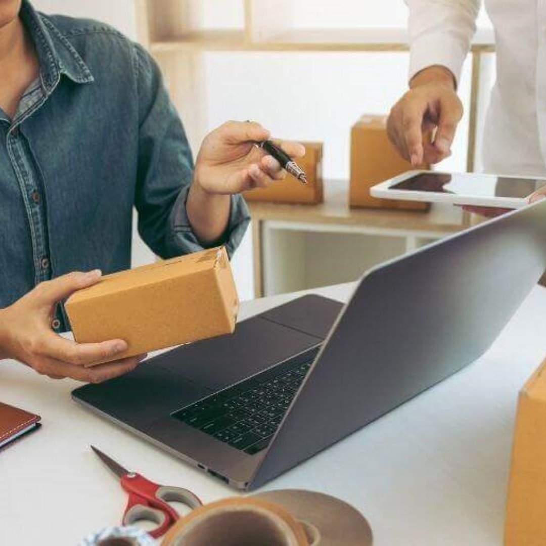 woman signing for package