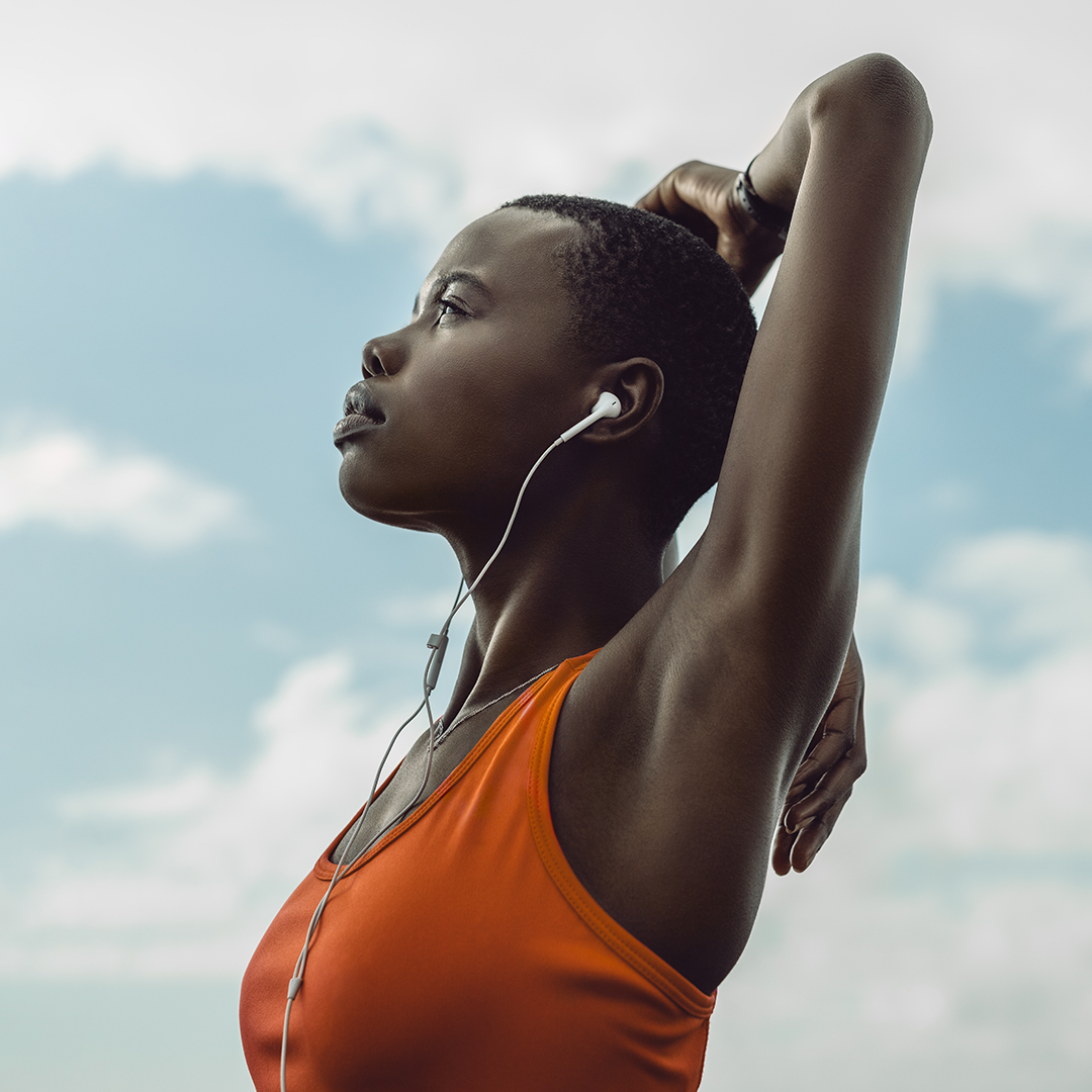 Exercising woman stretching