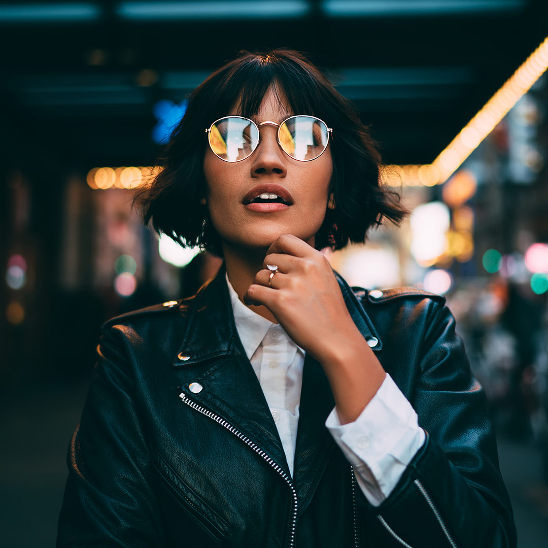 Woman outside with glasses on