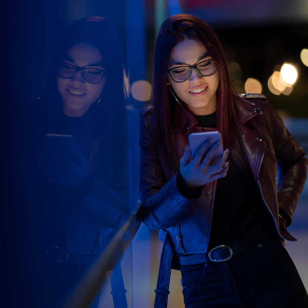 Woman looking at mobile device