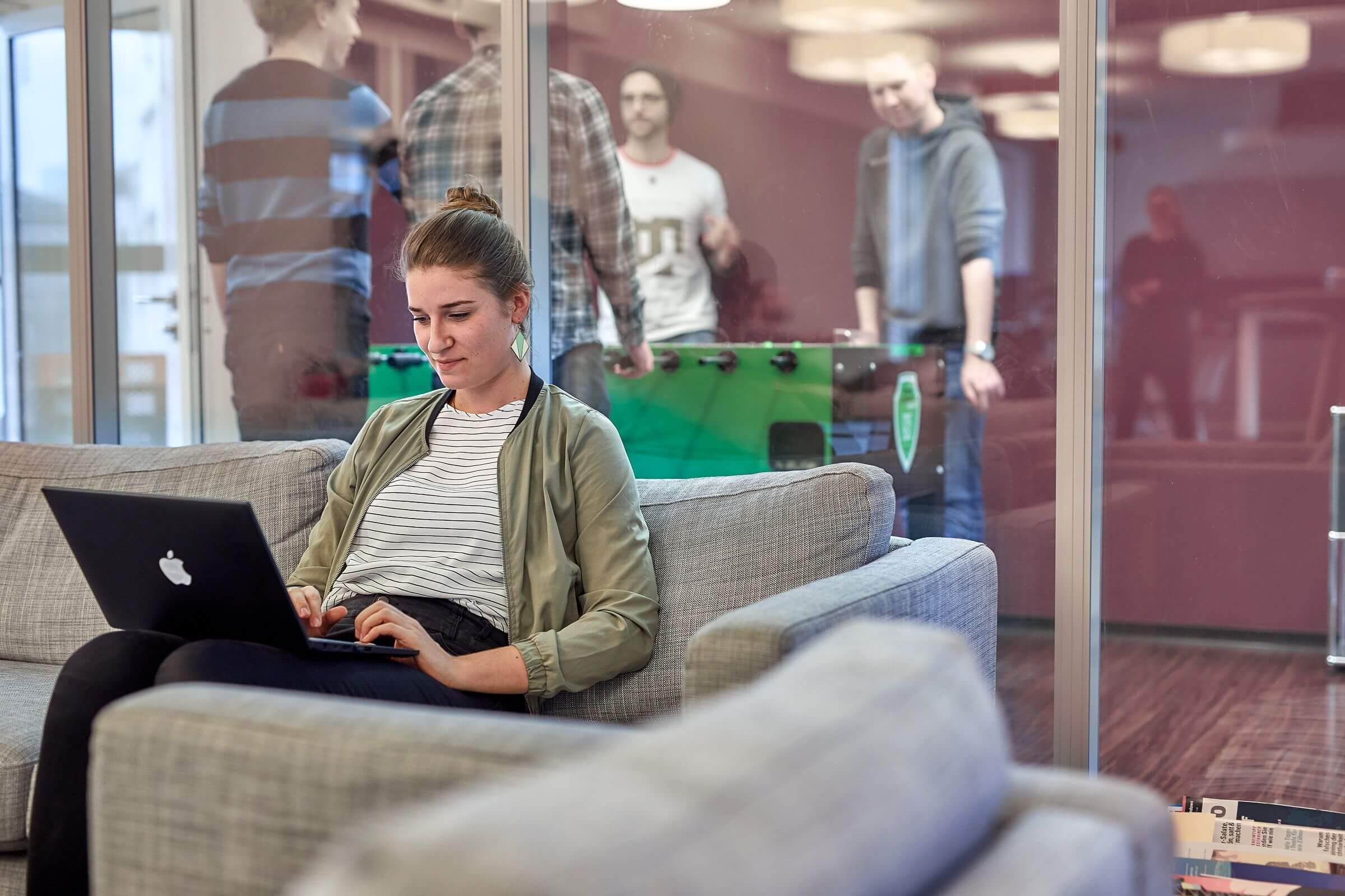 Woman working on laptop at Merkle Frankfurt