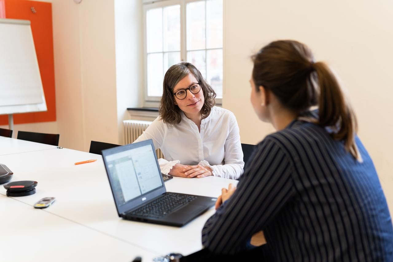 Two women having an interview in Merkle office