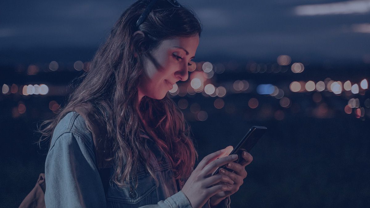 Woman holding Android smartphone